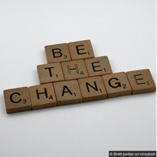Be the Change in Scrabble Steinen geschrieben