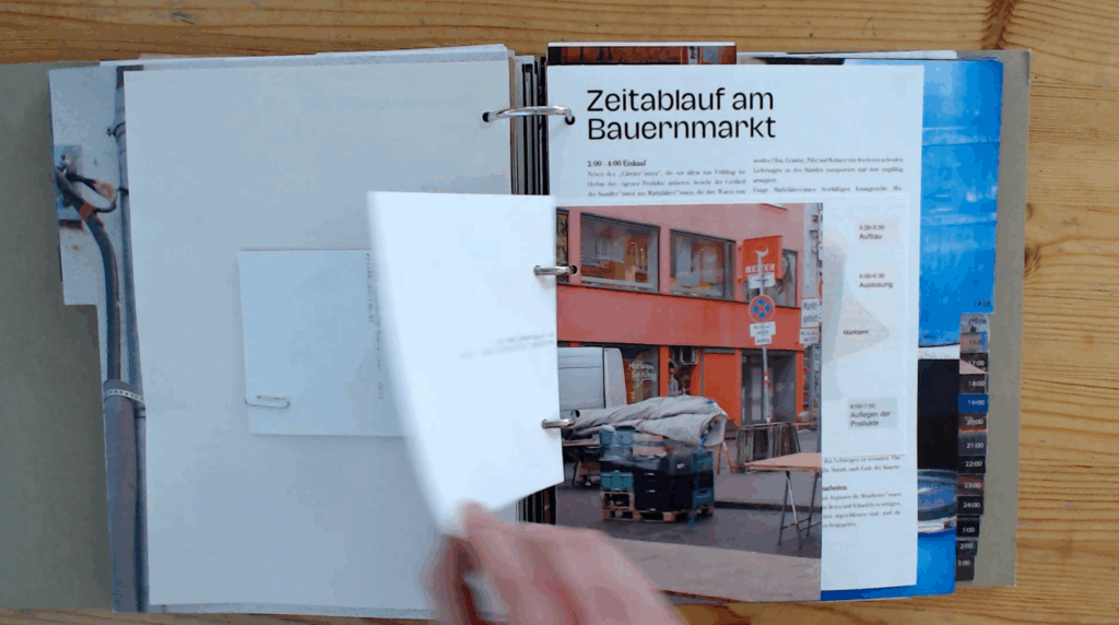 Eine Person blättert durch ein Magazin